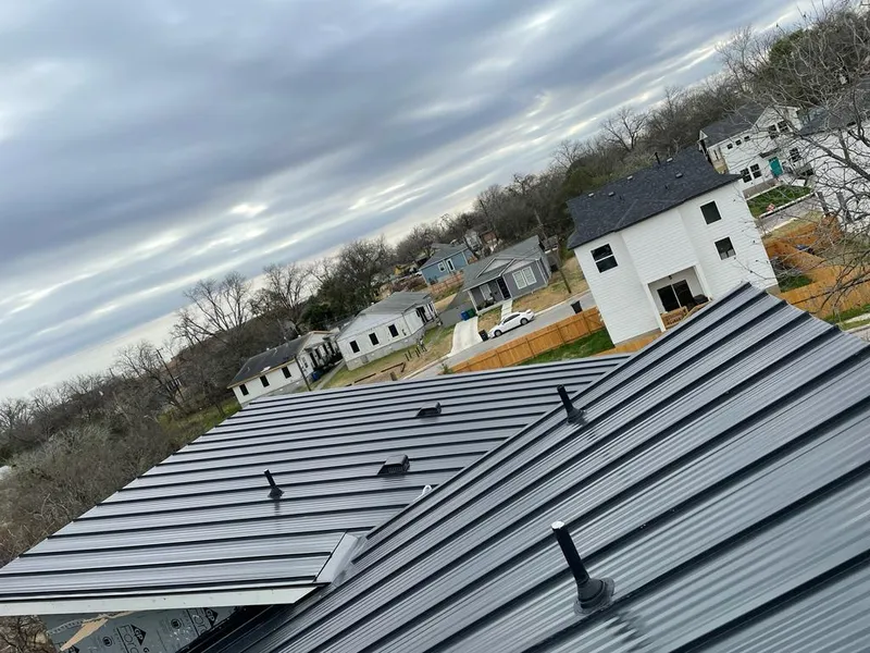 Standing seam metal roof panels with vents for Skylight Repair in North Hempstead
